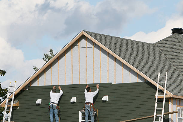 Professional Siding technician working in Keasbey, NJ